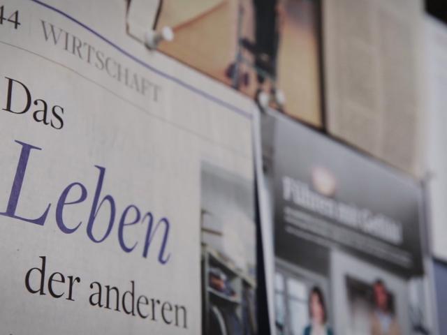 Plakat mit Slogan "Das Leben der anderen"